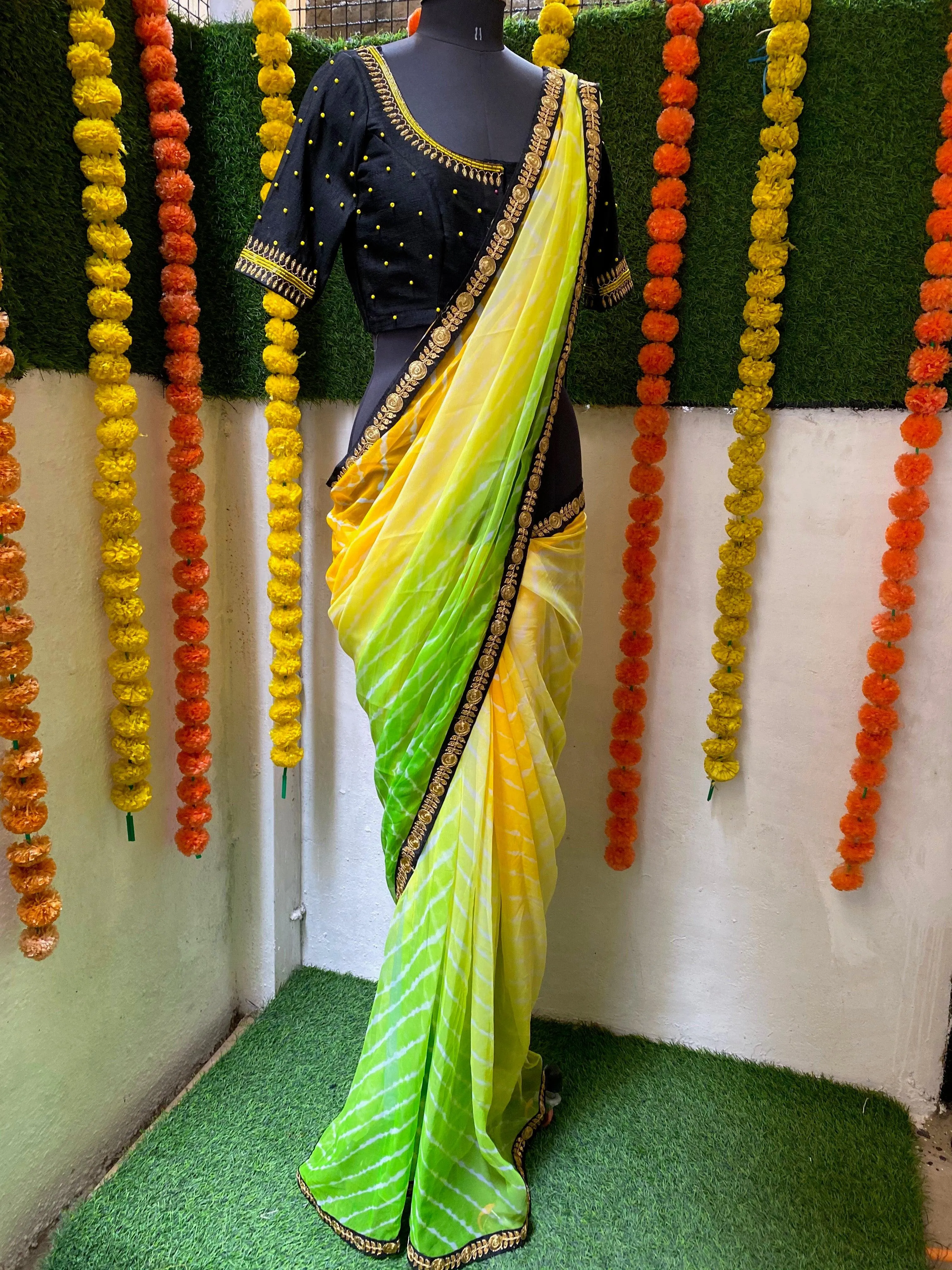 Tie and die green and yellow saree with aari work blouse