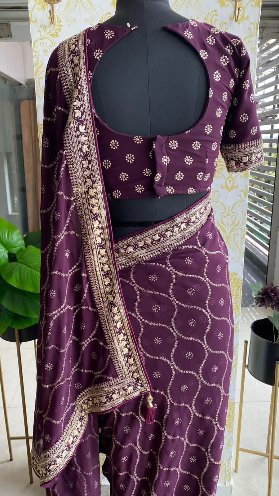 Wine georgette saree with embroidery worked Blouse