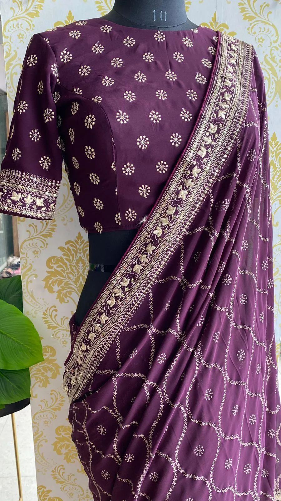 Wine georgette saree with embroidery worked Blouse