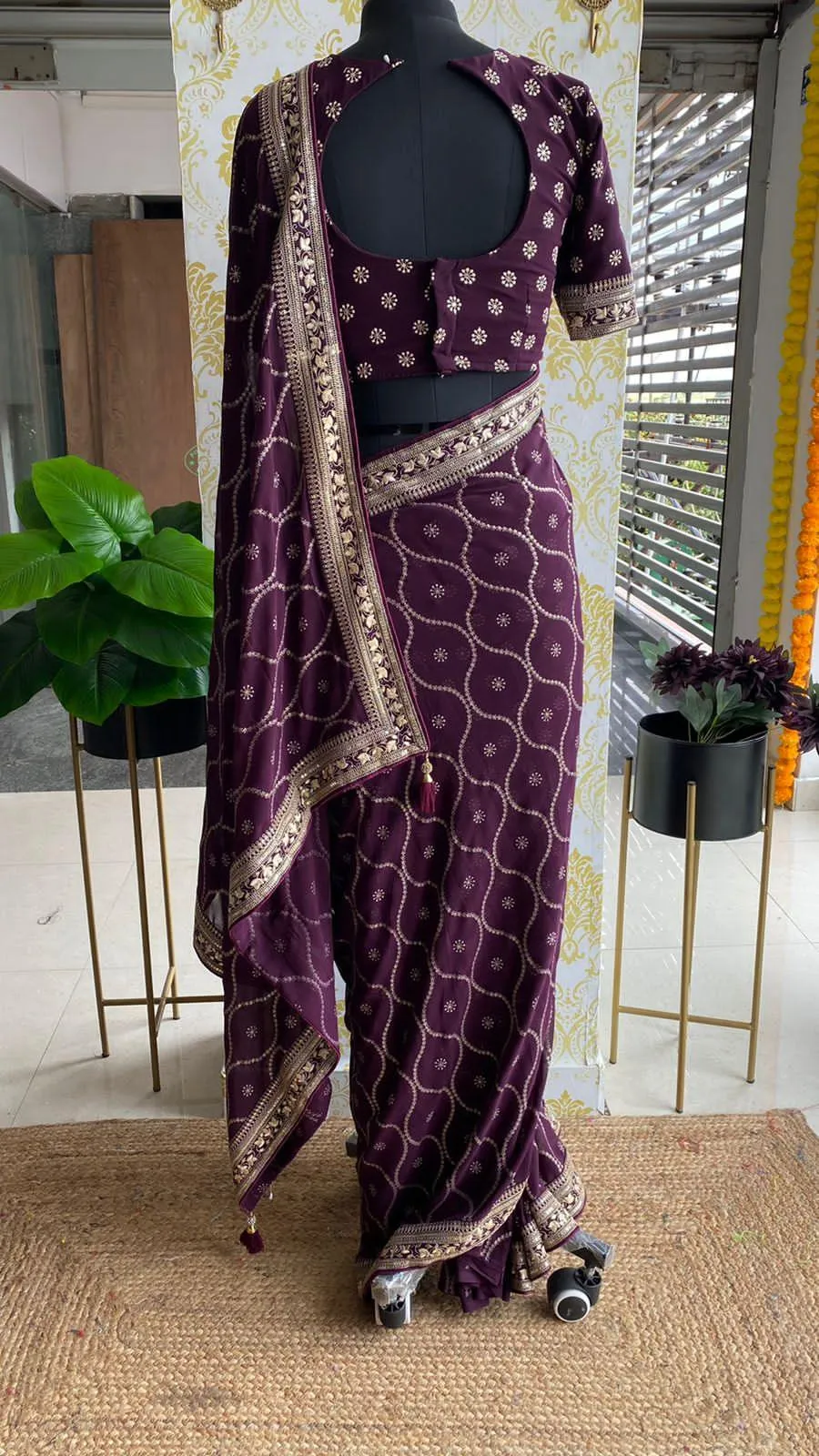 Wine georgette saree with embroidery worked Blouse