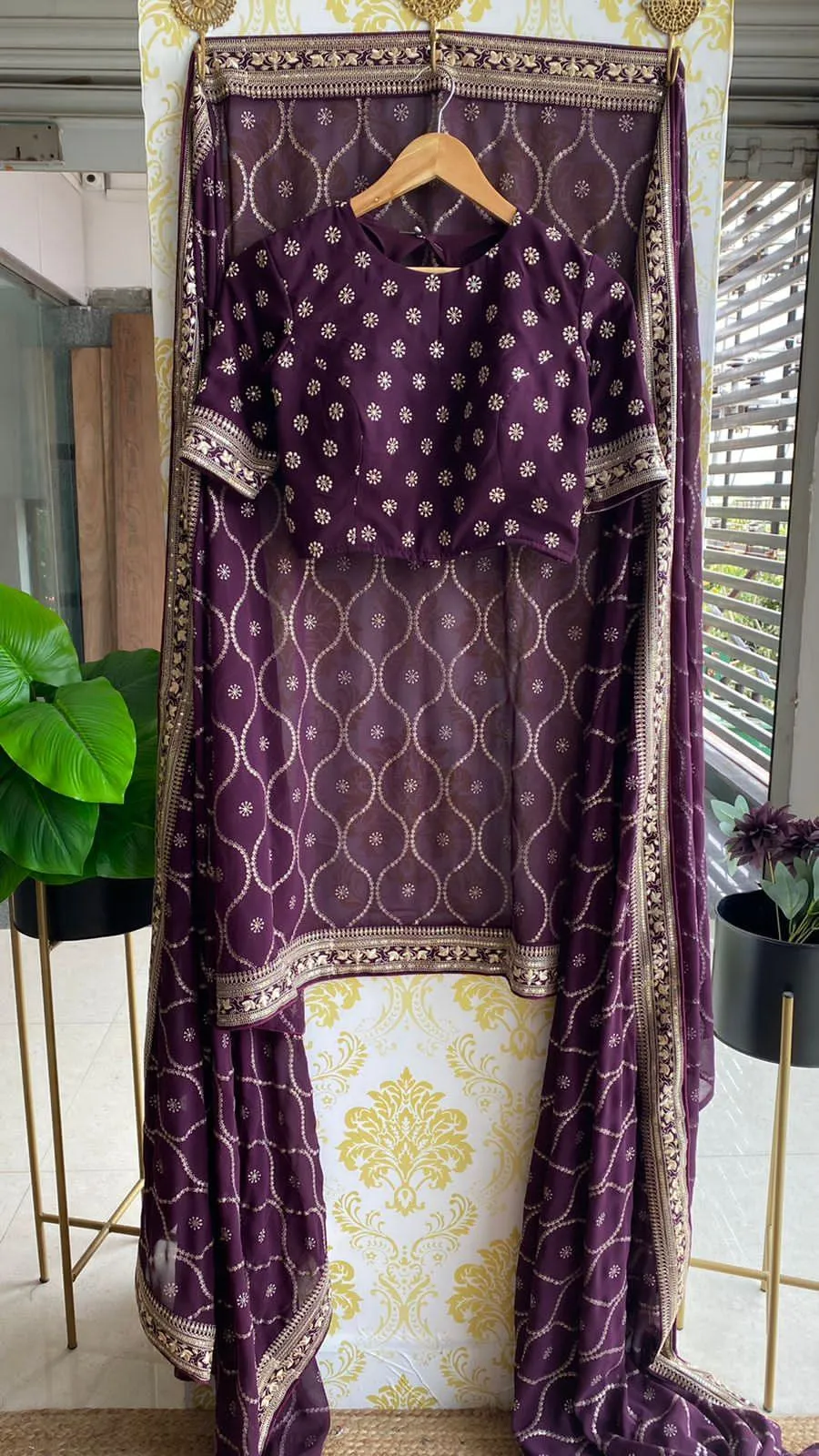 Wine georgette saree with embroidery worked Blouse
