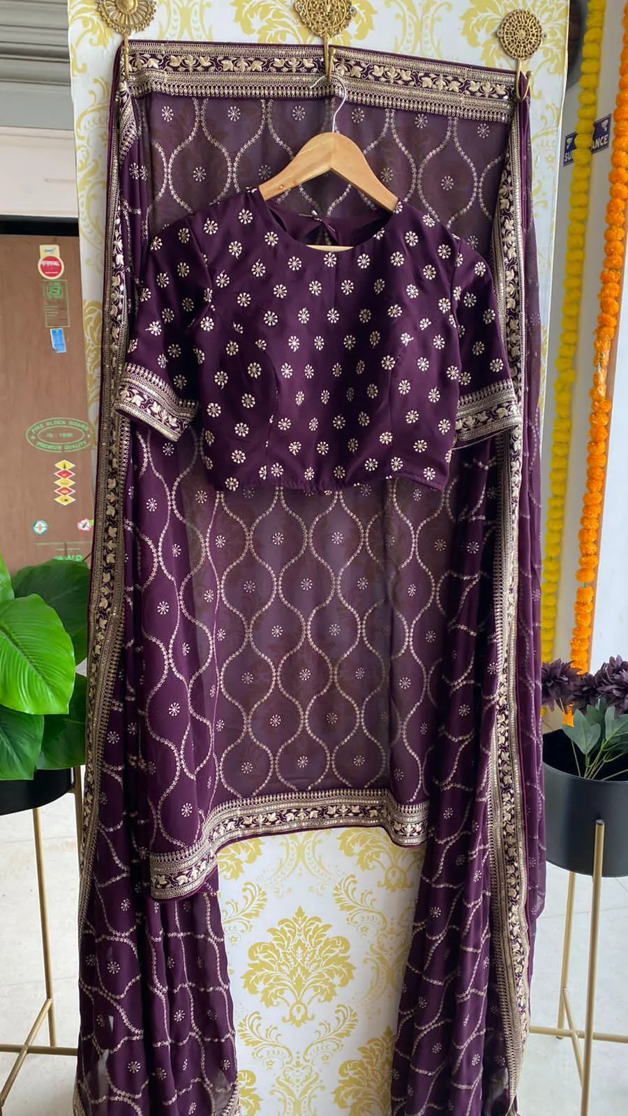 Wine georgette saree with embroidery worked Blouse